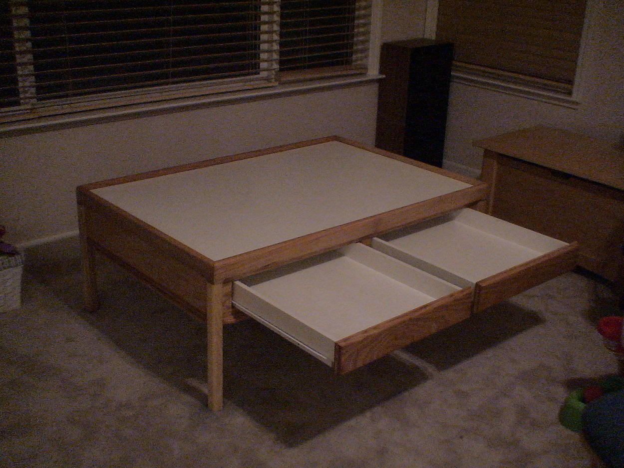 Finished table with drawers open