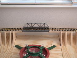 Shows bridge section in relation to tree stand