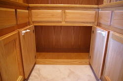 Open center cabinet - center has no shelf